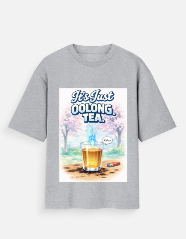 Oversized grey t-shirt with a calming oolong tea illustration and cozy minimal design